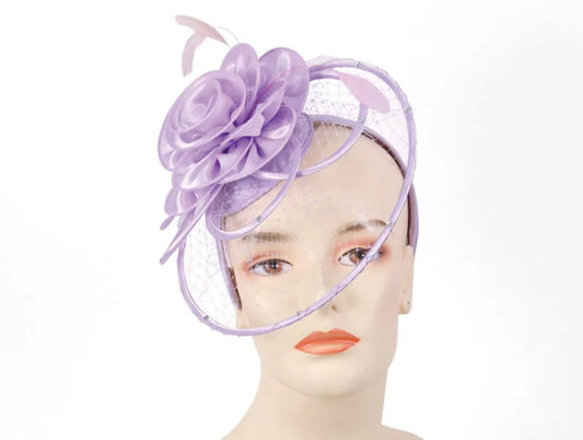 The Ferris Wheel fascinator is available in white, black, cream, lilac and yellow.